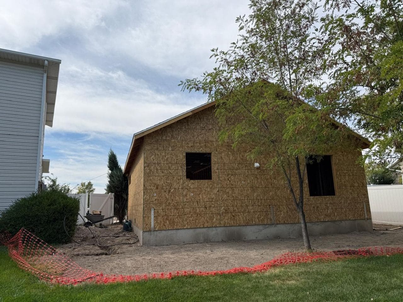 Side of the addition sheathed and ready for the weather barrier