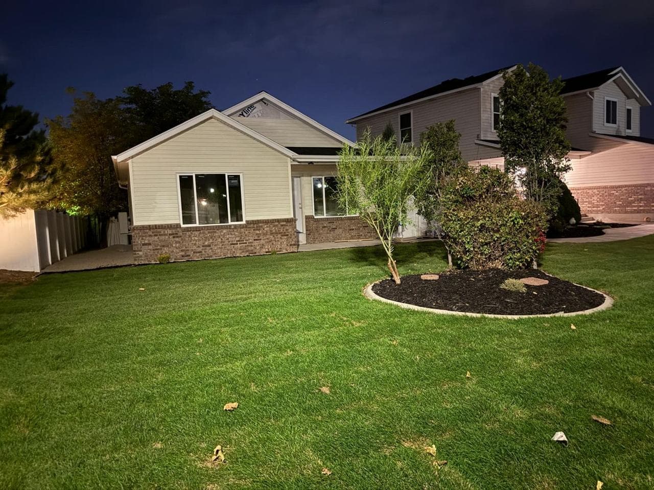 Front lawn and landscaping restored after construction